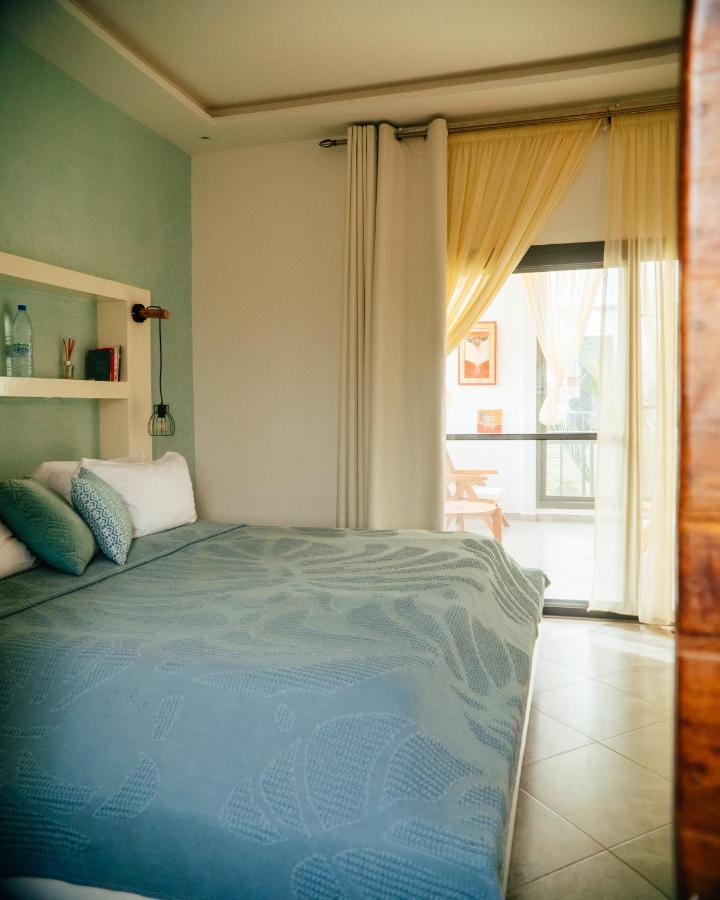 Guest House Casa S Ngaparou Quarto foto